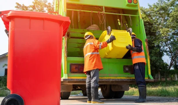 bigstock-Two-Garbage-Men-Working-Togeth-344763700-2-1-1-825x510